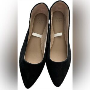 Black pointed flats